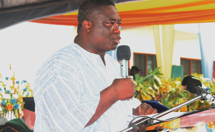 Nii Afotey Agbo, the Greater Accra Regional Minister addressing the students Nii Afotey Agbo, the Greater Accra Regional Minister addressing the students